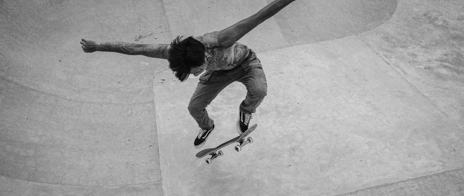Skatepark session under graffiti